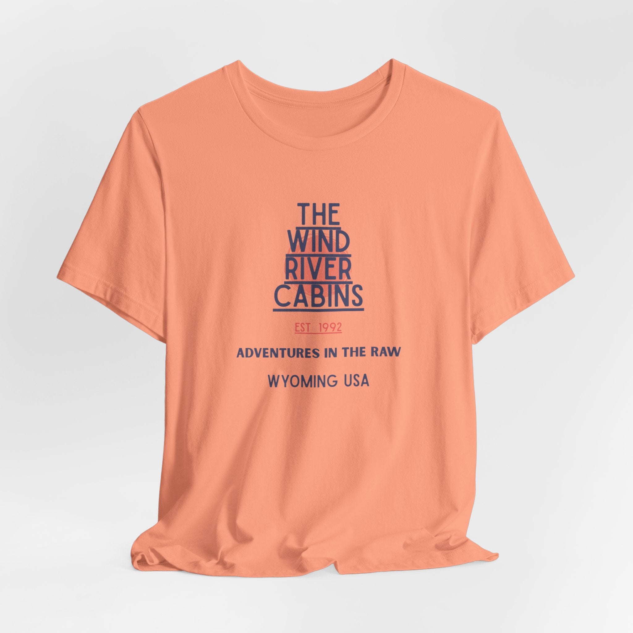 Wind River Cabins Adventure  (Clothing Optional Resort) Tee | Unisex Jersey Short Sleeve Shirt for Outdoor Enthusiasts, Travel Gifts, Cabin Decor, Nature Lover [...]