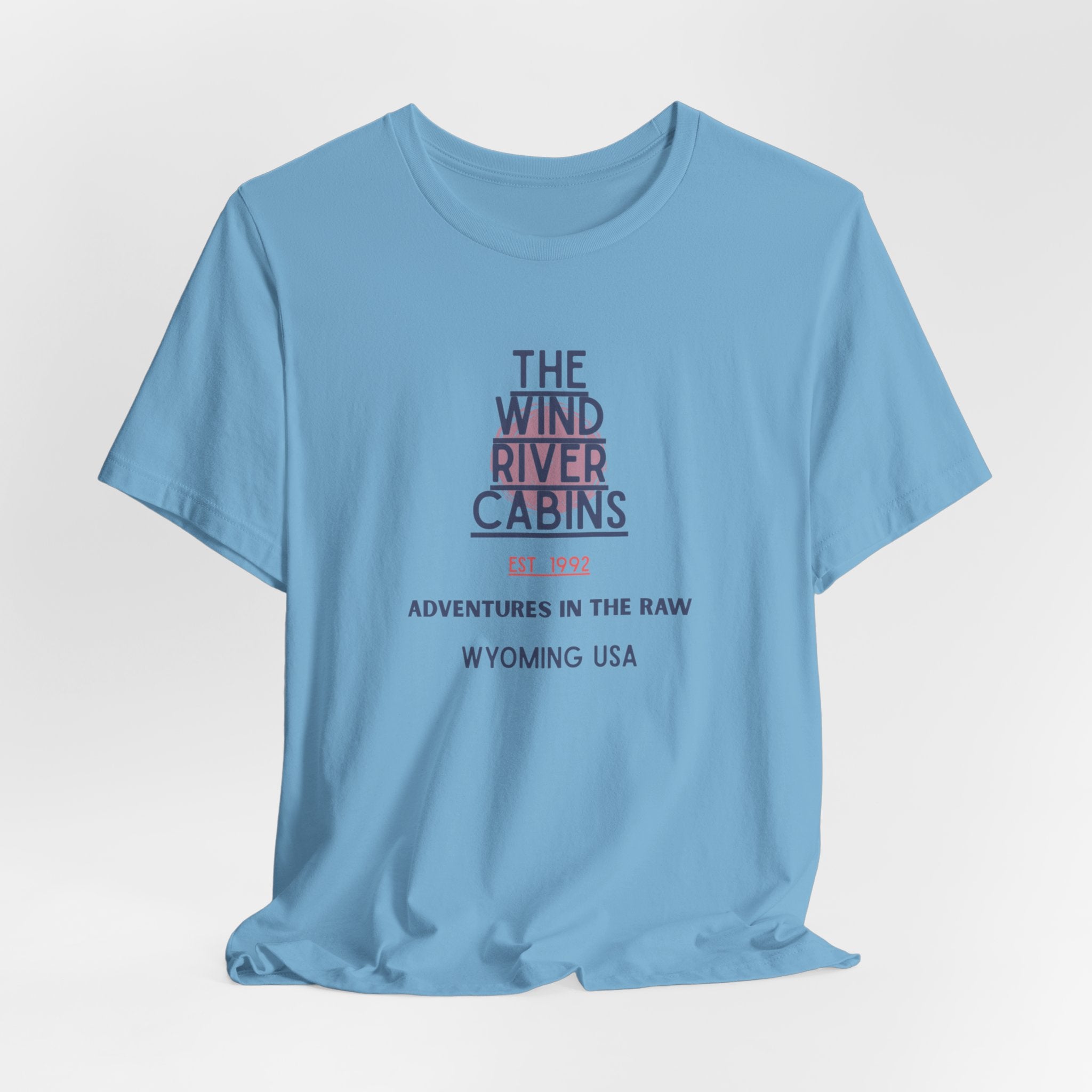 Wind River Cabins Adventure  (Clothing Optional Resort) Tee | Unisex Jersey Short Sleeve Shirt for Outdoor Enthusiasts, Travel Gifts, Cabin Decor, Nature Lover [...]