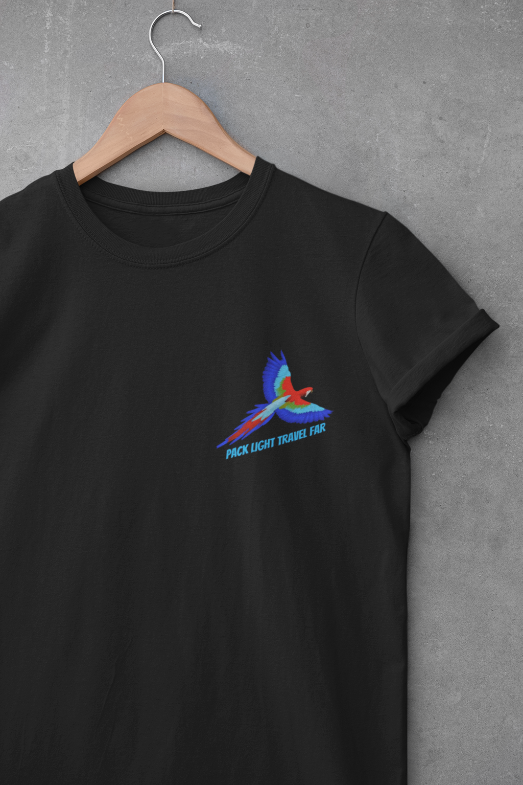 Express your Travel needs with  Pack Light and Travel Far Unisex T shirt with colorful Macaw Design